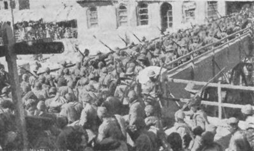 Turkish Prisoners arrive at Basra under escort by British Troops