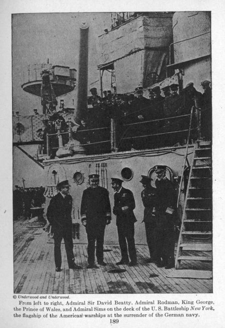 From left to right, Admiral Sir David Beatty, Admiral Rodman, King George, the Prince of Wales, and Admiral Sims on the deck of the U.S. Battleship New York, 