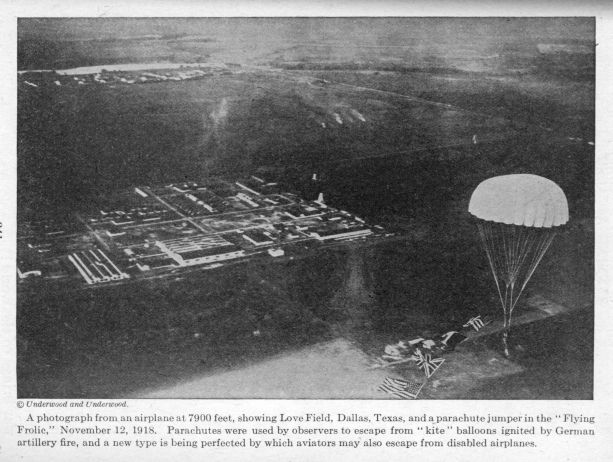 A photograph from an airplane at 7900 feet, showing Love Field, Dallas, Texas, and a parachute jumper. 