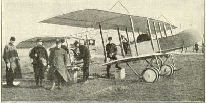 FRENCH AEROPLANE BEING REPAIRED ON THE FIELD