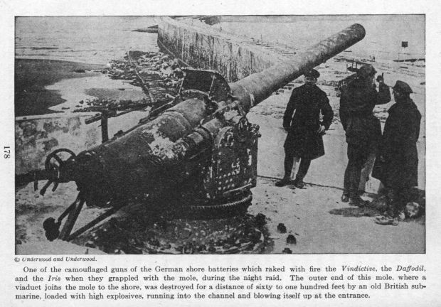 One of the camouflaged guns of the German shore batteries which raked with fire the Vindictive, the Daffodil, and the Iris when they grappled with the mole, during the night raid. 