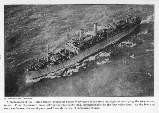 A photograph of the United States Transport George Washington taken from an airplane. 